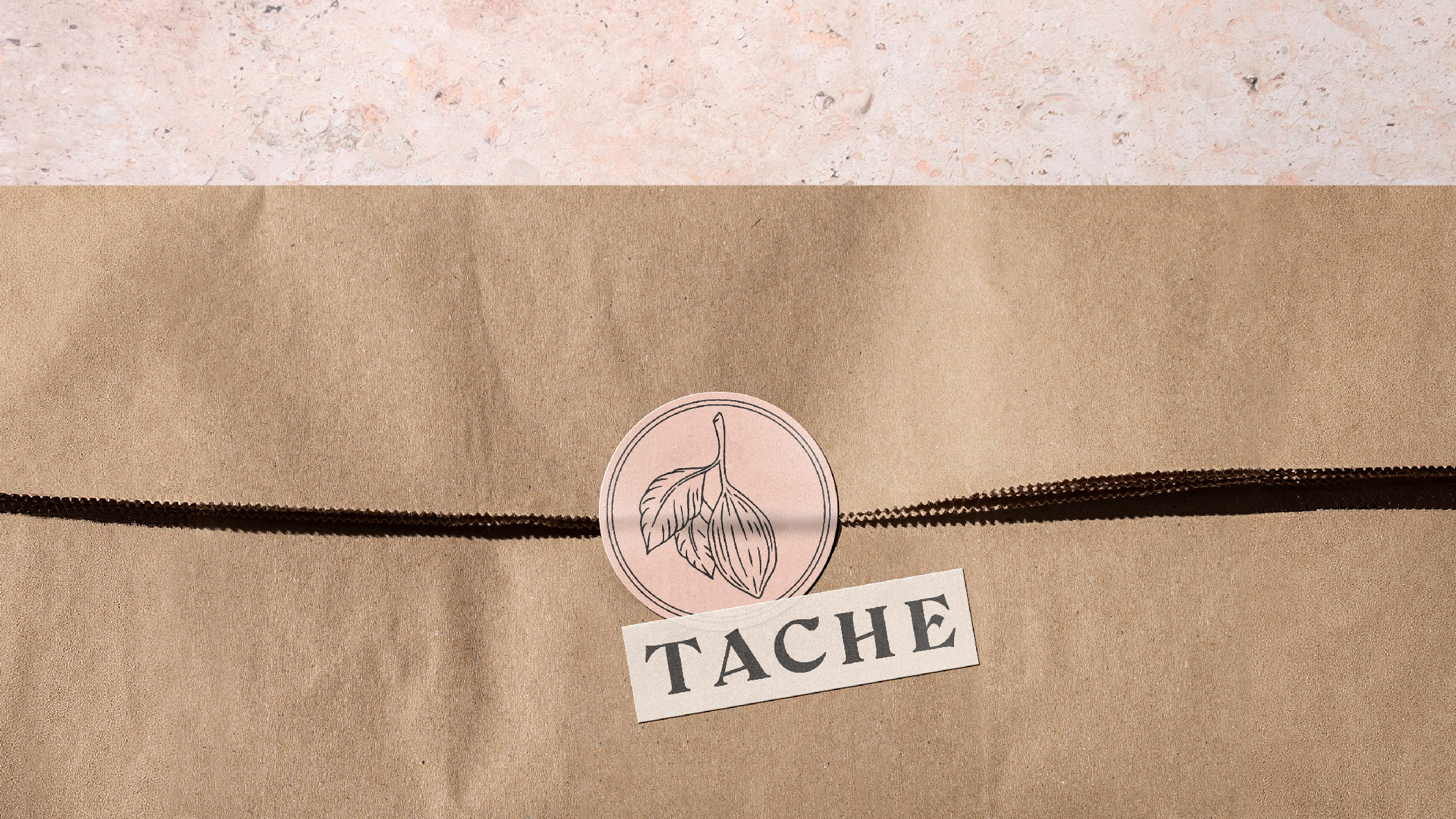 Brand stickers on brown paper bag with cocoa pod and vintage typography. 